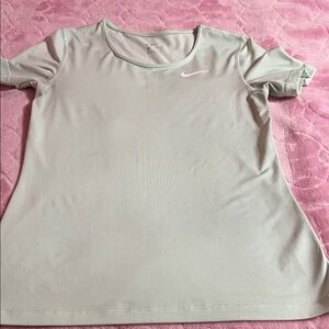 women’s nike light blue/teal shirt